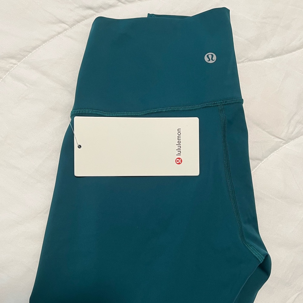 NWT size 6 Lululemon teal wunder under hr tight 28” inseam